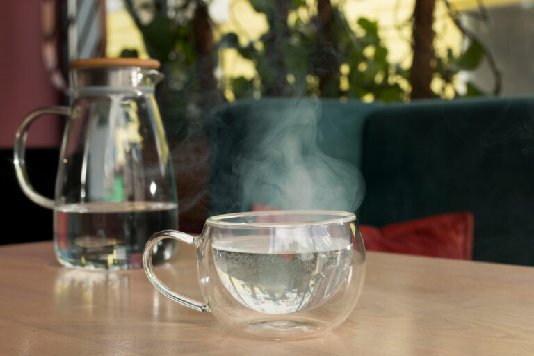 What are the proven benefits of drinking warm water in the morning?